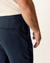 View of model wearing Navy Blazer Go Airweave Chino, Straight Fit.