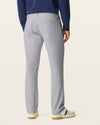 Back view of model wearing Sharkskin Go Airweave 5-Pocket, Straight Fit.
