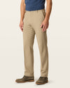 Side view of model wearing Timber Wolf Easy Khakis, Straight Fit.