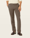 Back view of model wearing Dark Pebble Easy Khakis, Straight Fit.