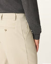Side view of model wearing Cloud Easy Khakis, Classic Fit.