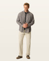 Front view of model wearing Cloud Easy Khakis, Classic Fit.
