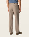 Back view of model wearing Dark Pebble Easy Khakis, Classic Fit.