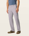 Side view of model wearing Burma Grey Easy Khakis, Classic Fit.
