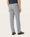 Back view of model wearing High-Rise Workday Khakis, Slim Fit.