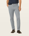 Side view of model wearing High-Rise Workday Khakis, Slim Fit.