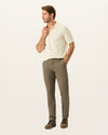 Front view of model wearing Dark Pebble Easy Khakis, Slim Fit.