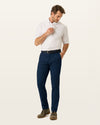 Front view of model wearing Navy Easy Khakis, Slim Fit.