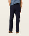 Back view of model wearing Pembroke Workday Khakis, Classic Fit.