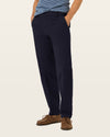 Side view of model wearing Pembroke Workday Khakis, Classic Fit.