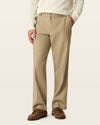 Front view of model wearing Khaki Easy Stretch Khakis, Relaxed Fit.