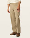 Side view of model wearing Khaki Easy Stretch Khakis, Relaxed Fit.
