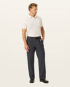 Front view of model wearing Black Easy Stretch Khakis, Pleated, Relaxed Fit.