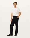 Front view of model wearing Beautiful Black Signature Iron Free Khakis, Classic Fit with Stain Defender®.