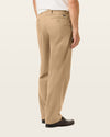 Back view of model wearing New British Khaki Signature Iron Free Khakis, Classic Fit with Stain Defender®.