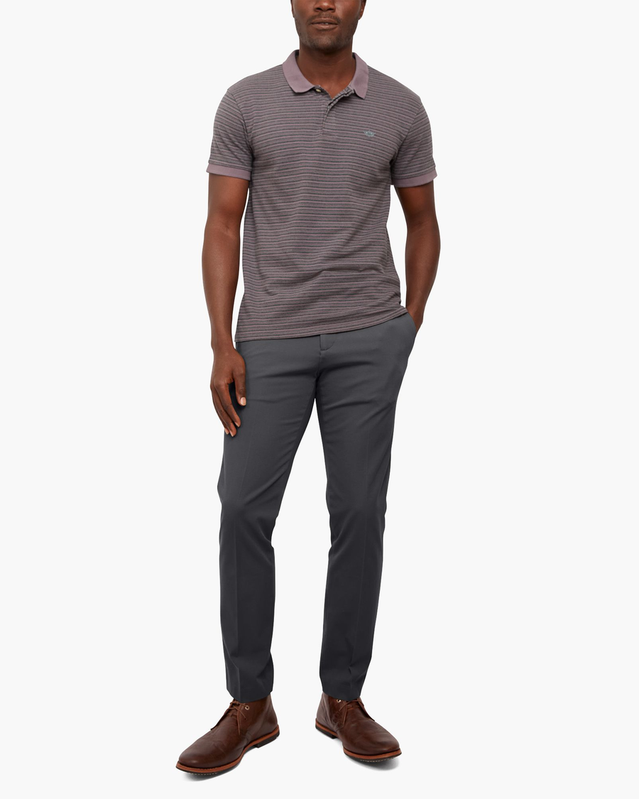 Front view of model wearing Asphalt City Tech Trousers, Slim Fit.