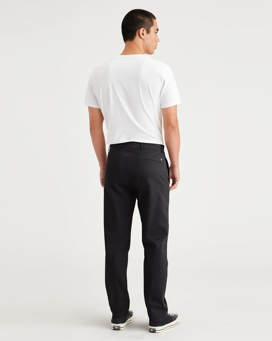 Back view of model wearing Beautiful Black Essential Chinos, Slim Fit.