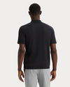 View of model wearing Beautiful Black Go Polo, Regular Fit.