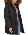 View of model wearing Black Hooded Parka.