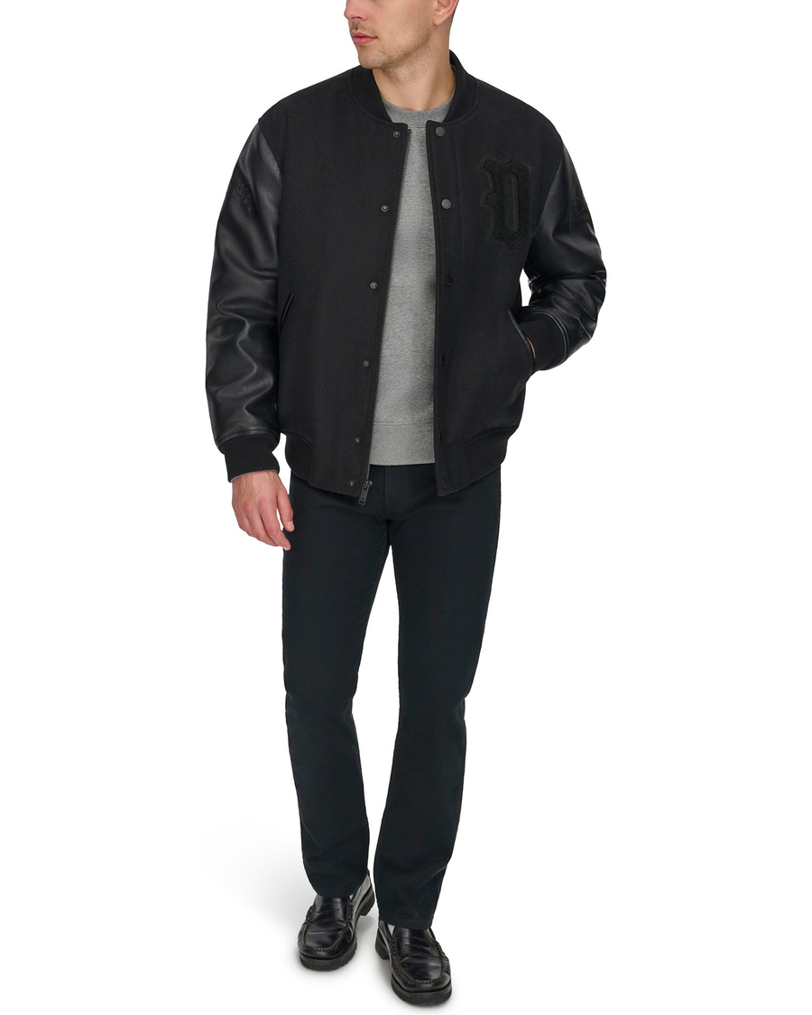 View of model wearing Black Varsity Bomber Jacket.