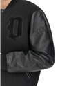 View of model wearing Black Varsity Bomber Jacket.