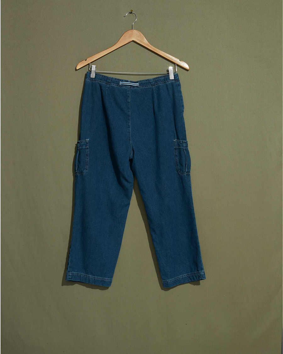 Back view of model wearing Blue Denim Cargo Pants with Draw String Waist - 28 x 22.