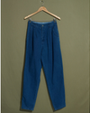 Front view of model wearing Blue Made in USA, Double Pleated Denim Pants - 26 x 30.