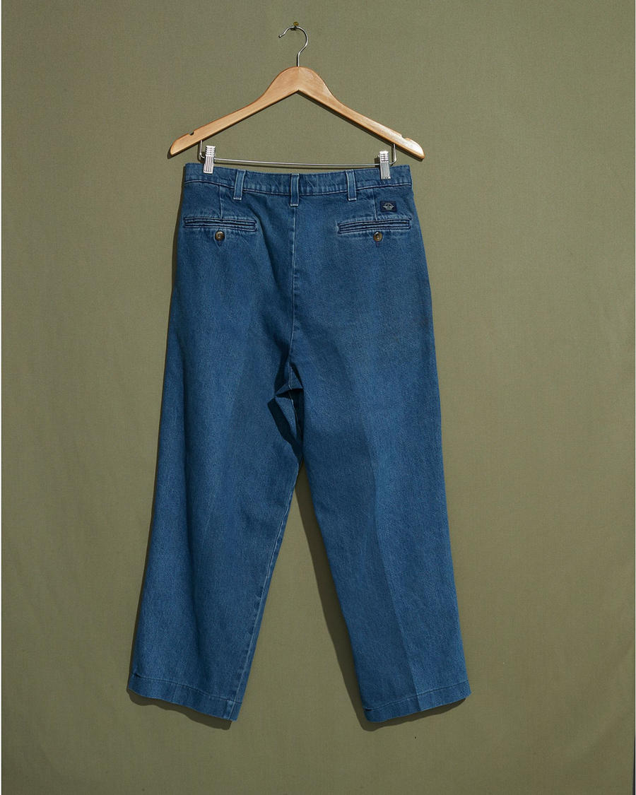 Back view of model wearing Blue Made in USA, Double Pleated Denim Pants - 31 x 26.