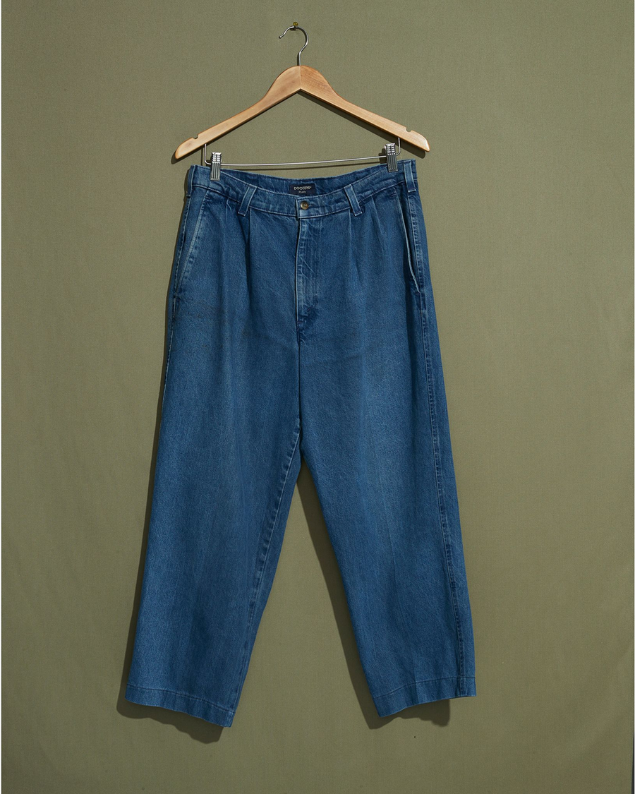 Front view of model wearing Blue Made in USA, Double Pleated Denim Pants - 31 x 26.