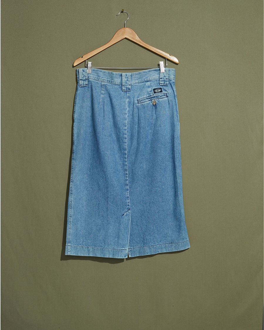 Back view of model wearing Blue Made in USA, Pleated Denim Skirt - 33 x 30.