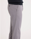 Side view of model wearing Burma Grey Easy Khakis, Slim Fit.