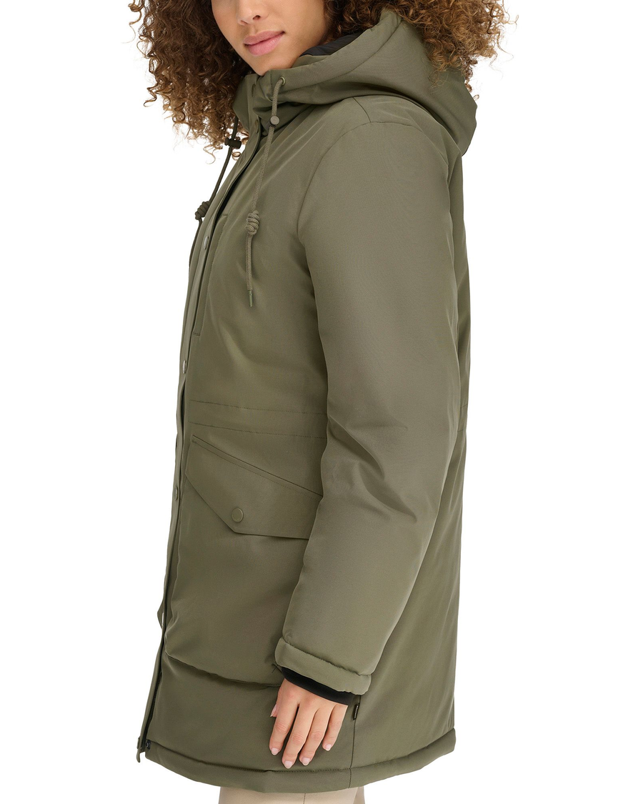 View of model wearing Camo Olive Hooded Parka.