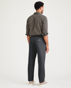 Back view of model wearing Charcoal Heather Signature Iron Free Khakis, Pleated, Classic Fit with Stain Defender®.