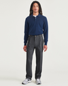 Front view of model wearing Charcoal Heather Signature Iron Free Khakis, Pleated, Relaxed Fit with Stain Defender®.