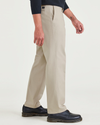 Side view of model wearing Cloud Signature Iron Free Khakis, Classic Fit with Stain Defender®.