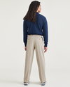 Back view of model wearing Cloud Signature Iron Free Khakis, Pleated, Relaxed Fit with Stain Defender®.