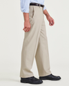 Side view of model wearing Cloud Signature Iron Free Khakis, Relaxed Fit with Stain Defender®.