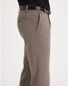 Side view of model wearing Dark Pebble Easy Khakis, Slim Fit.