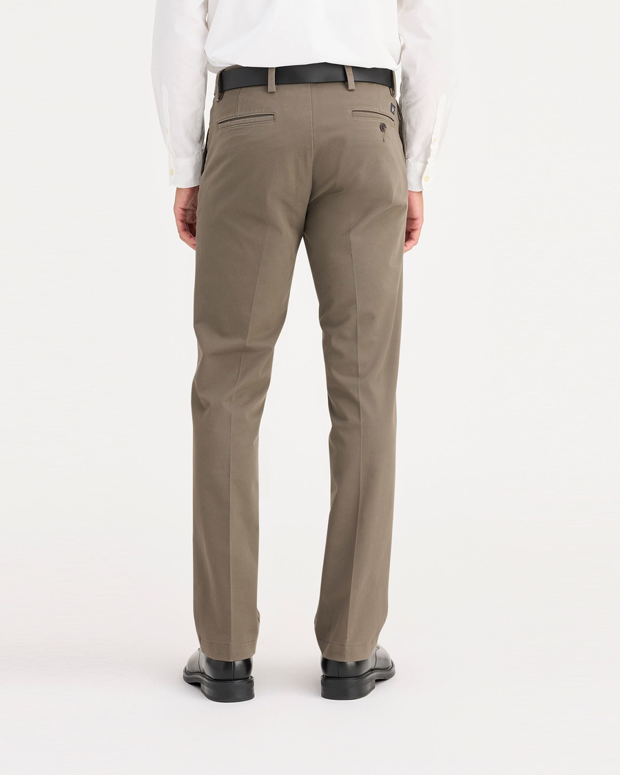 Back view of model wearing Dark Pebble Workday Khakis, Slim Fit.