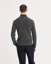 Back view of model wearing Deep Forest Turtleneck Sweater, Regular Fit.