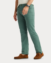 View of model wearing Duck Green Jean Cut Pants, Straight Fit.