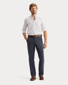 View of model wearing Harris India Ink Workday Khakis, Straight Fit.