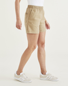 Side view of model wearing Harvest Gold Clay Pull-On Short.