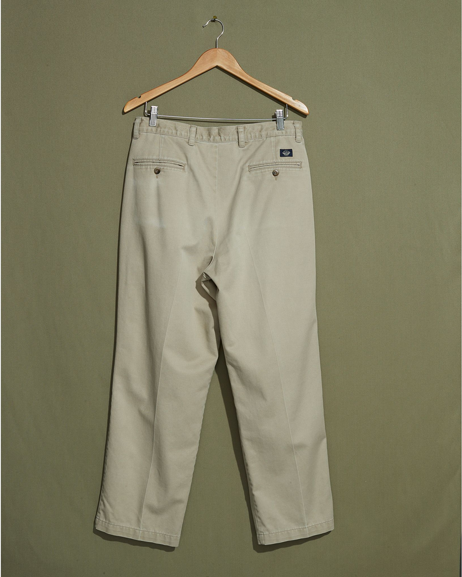 Back view of model wearing Khaki Double Pleated Khaki Pants - 32 x 28.