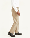 View of model wearing Khaki Easy Khakis, Pleated, Relaxed Fit.