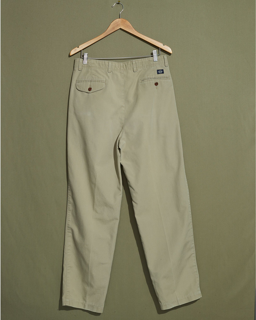 Back view of model wearing Khaki Made in USA, Double Pleated Khaki Pants - 32 x 31.