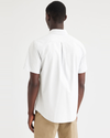 View of model wearing Lucent White Essential Button-Up Shirt, Classic Fit.