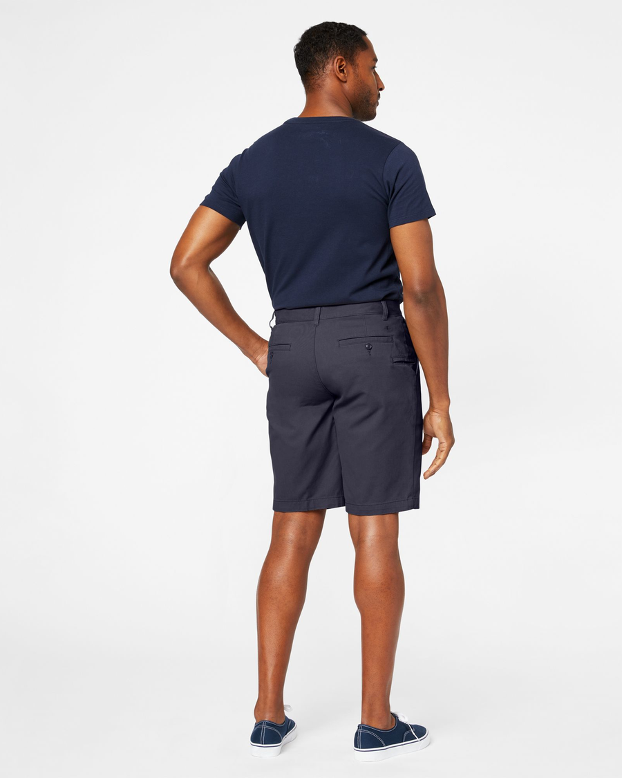 Back view of model wearing Maritime Perfect 10.5" Shorts.