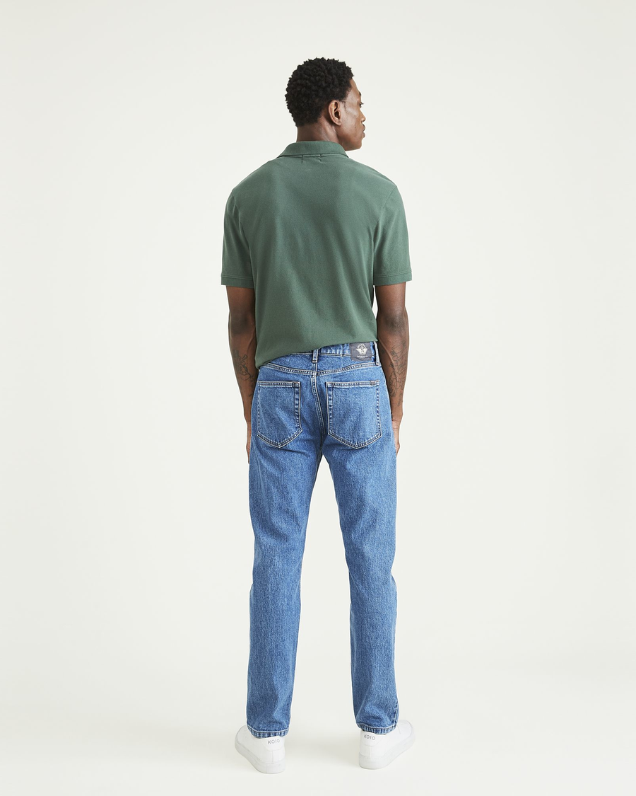 Back view of model wearing Mist Jean Cut Pants, Straight Fit.