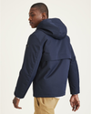 Back view of model wearing Navy Blazer Flex Tech Welded Flange Hoodie.